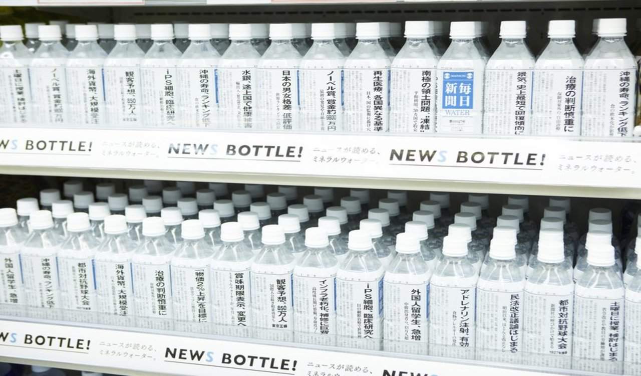 Newspaper prints news on bottles of water