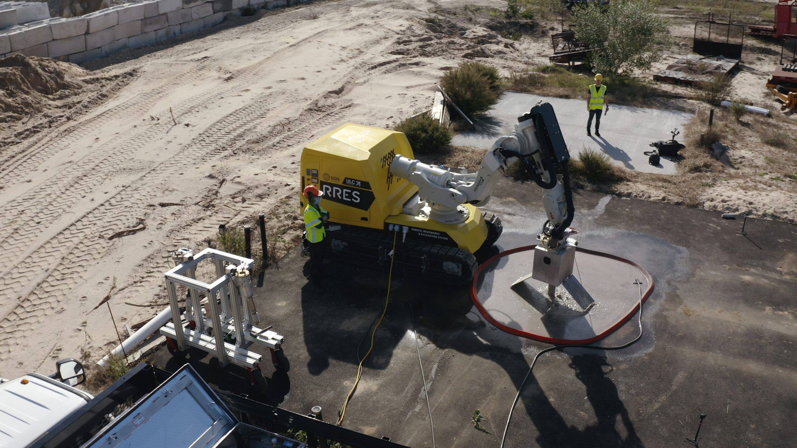 In pictures: chainsaw-wielding roadworks robot set for trial